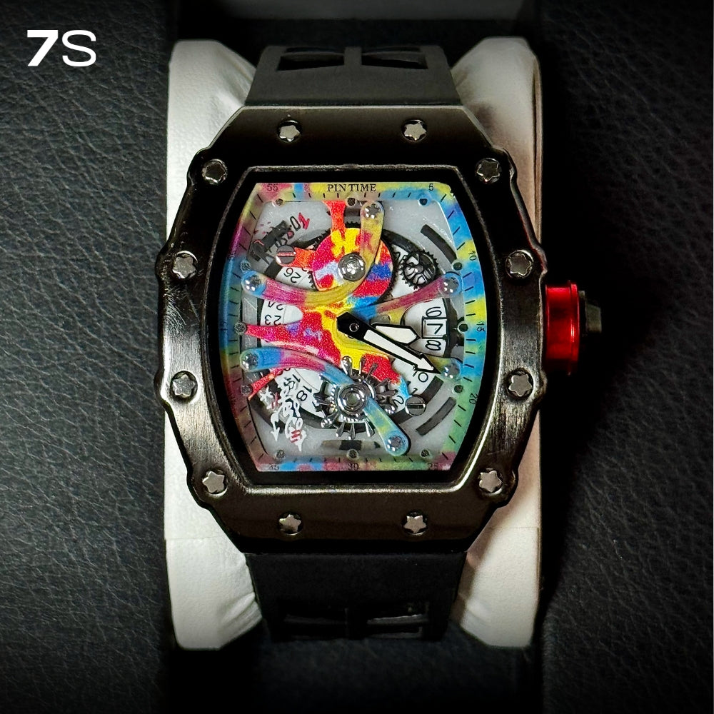 Relógio masculino 7SUIT Graffiti com caixa preta escovada, mostrador colorido estilo grafite e pulseira de silicone preta. Visual ousado para homens com personalidade forte.