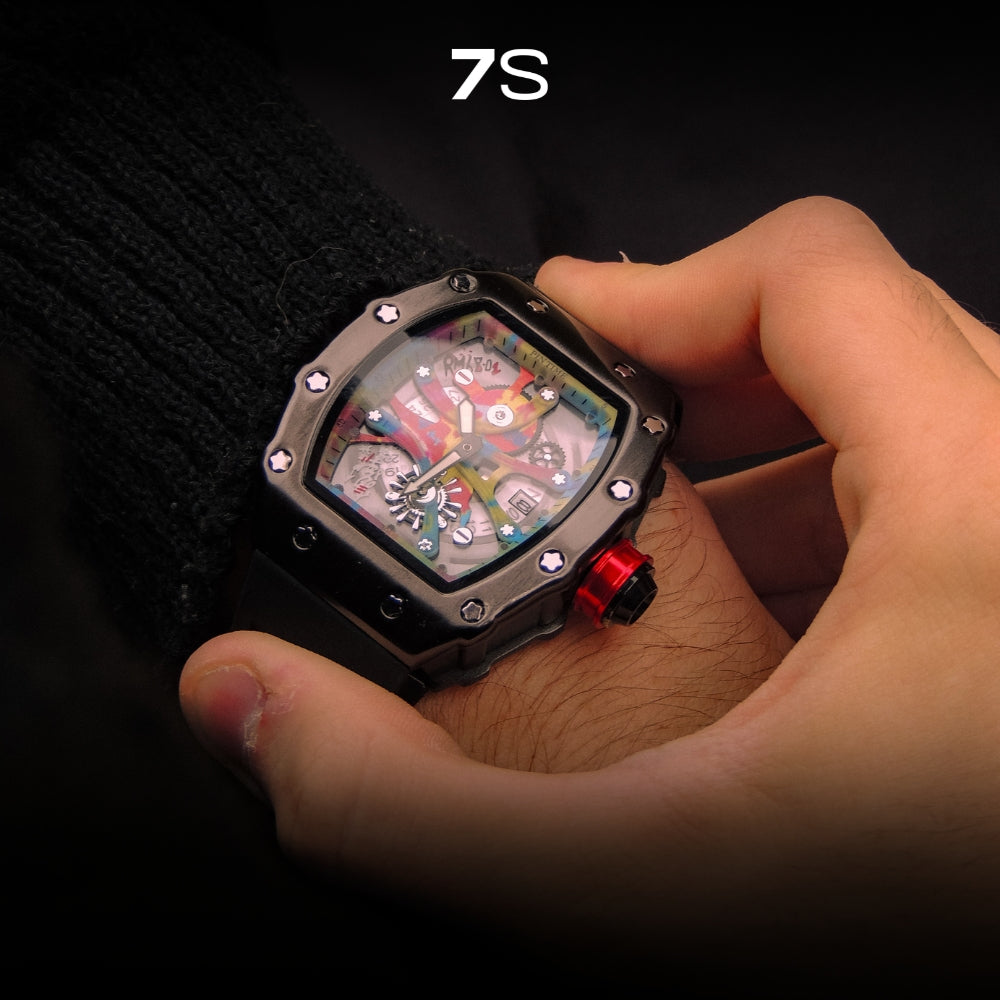 Relógio masculino 7SUIT Graffiti com caixa preta escovada, mostrador colorido estilo grafite e pulseira de silicone preta. Visual ousado para homens com personalidade forte.