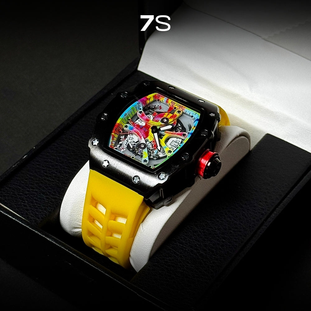 Relógio masculino 7SUIT Graffiti com caixa preta escovada, mostrador colorido estilo grafite e pulseira de silicone preta. Visual ousado para homens com personalidade forte.