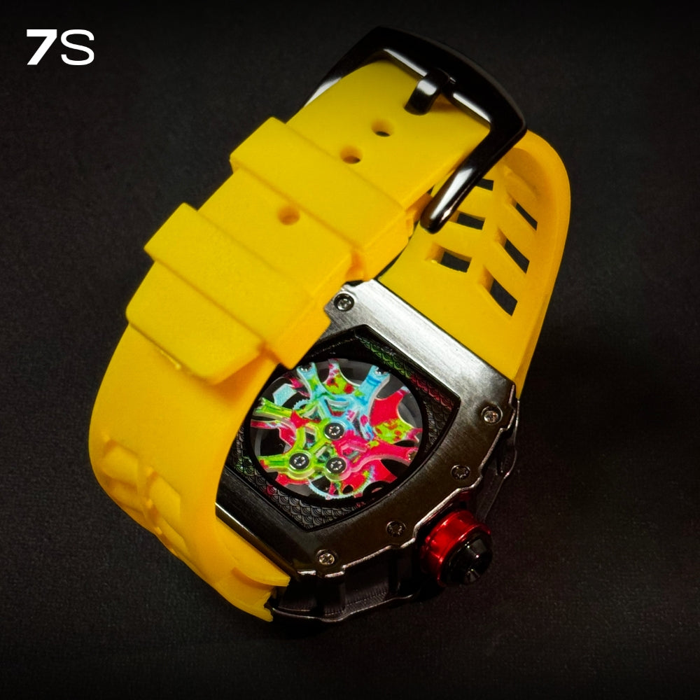 Relógio masculino 7SUIT Graffiti com caixa preta escovada, mostrador colorido estilo grafite e pulseira de silicone preta. Visual ousado para homens com personalidade forte.